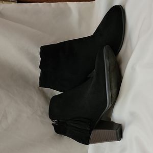 Black suede ankle booties with fringe